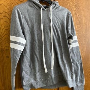 Brand new grey pull over jacket.